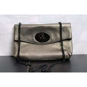 Beautiful Gold Coach Bag With Black Accents And Chain Shoulder Strap